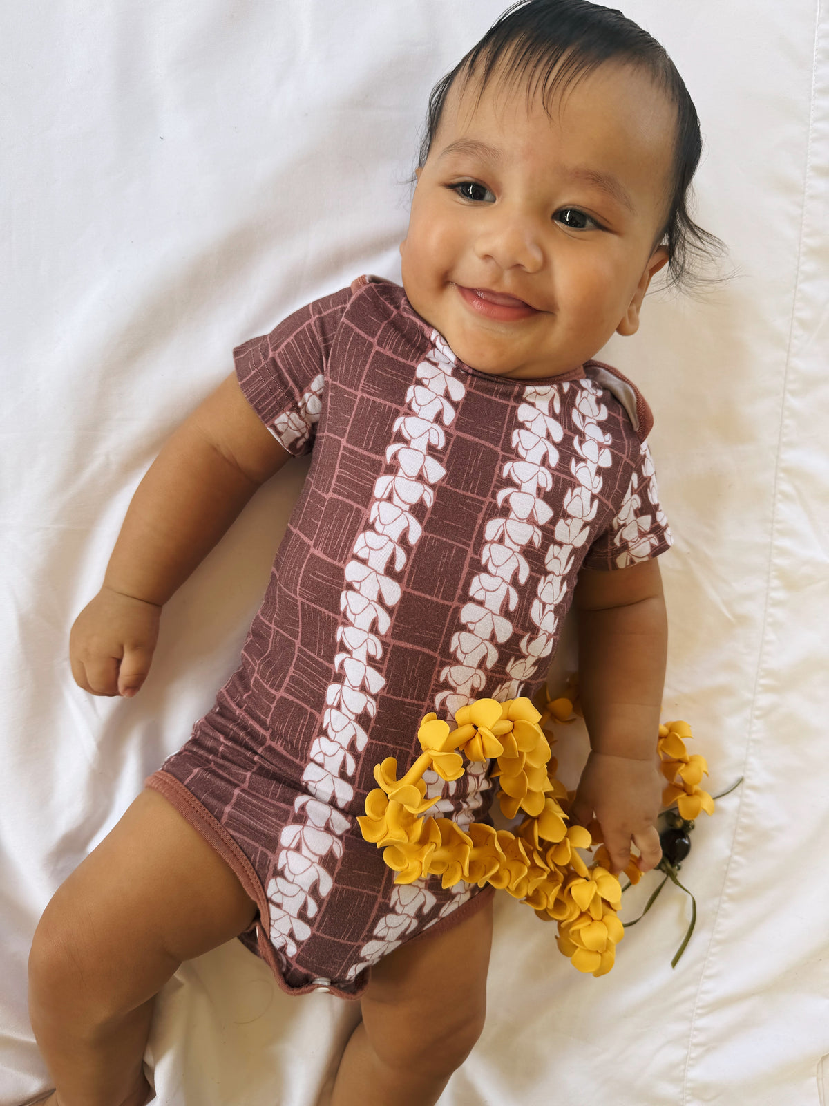 Puakenikeni Lauhala onesie
