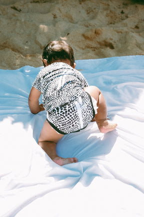 Leopard cone shell onesie