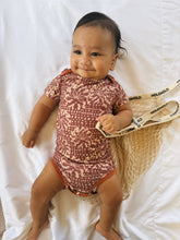 Naupaka shell onesie