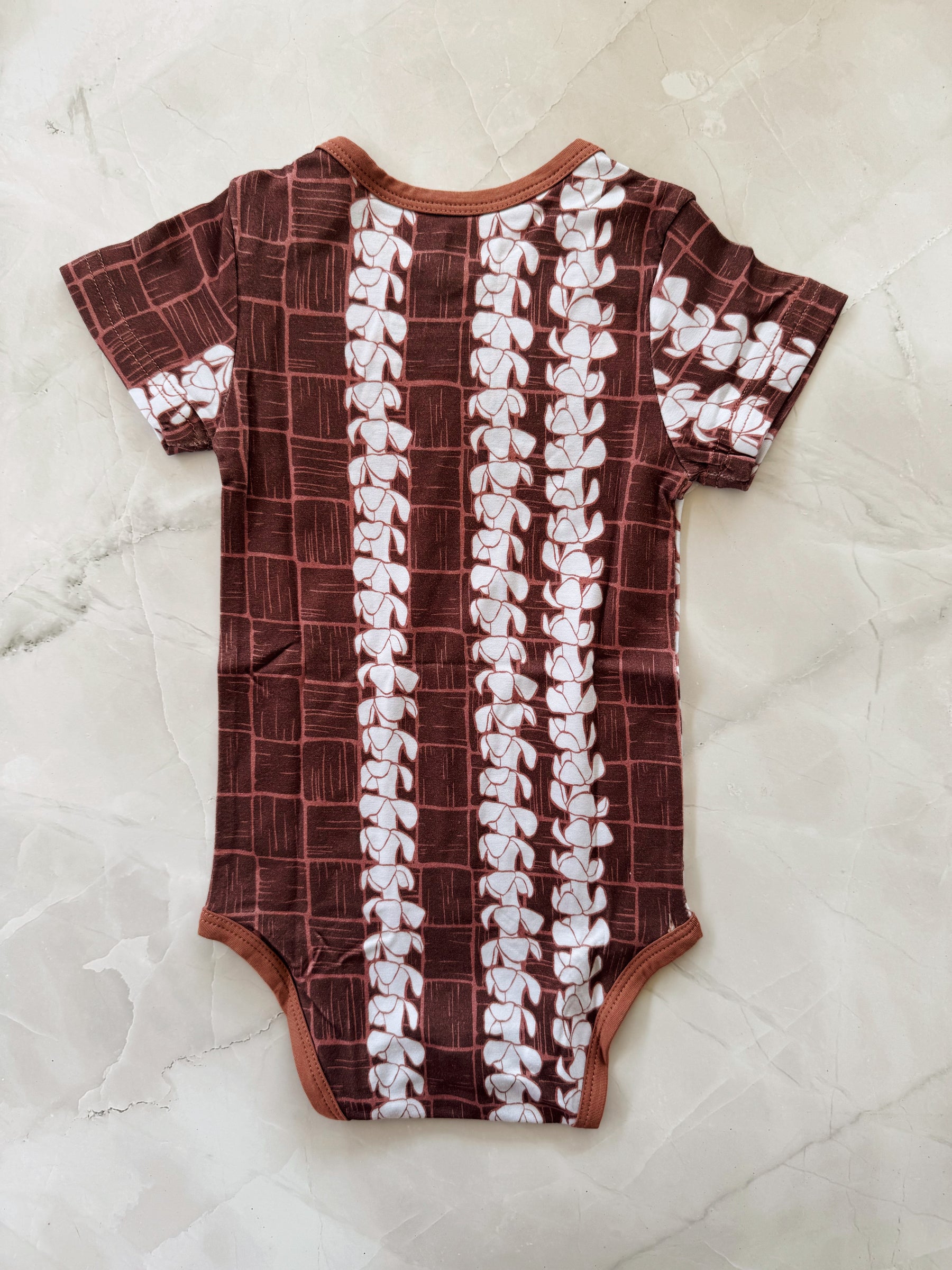 Puakenikeni Lauhala onesie