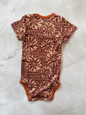 Naupaka shell onesie