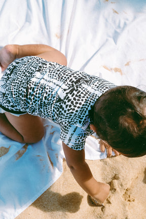 Leopard cone shell onesie