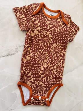 Naupaka shell onesie