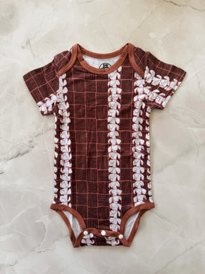 Puakenikeni Lauhala onesie